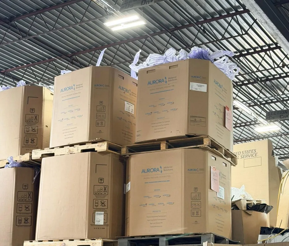 Clear flexible medical-grade PVC scrap in cardboard box